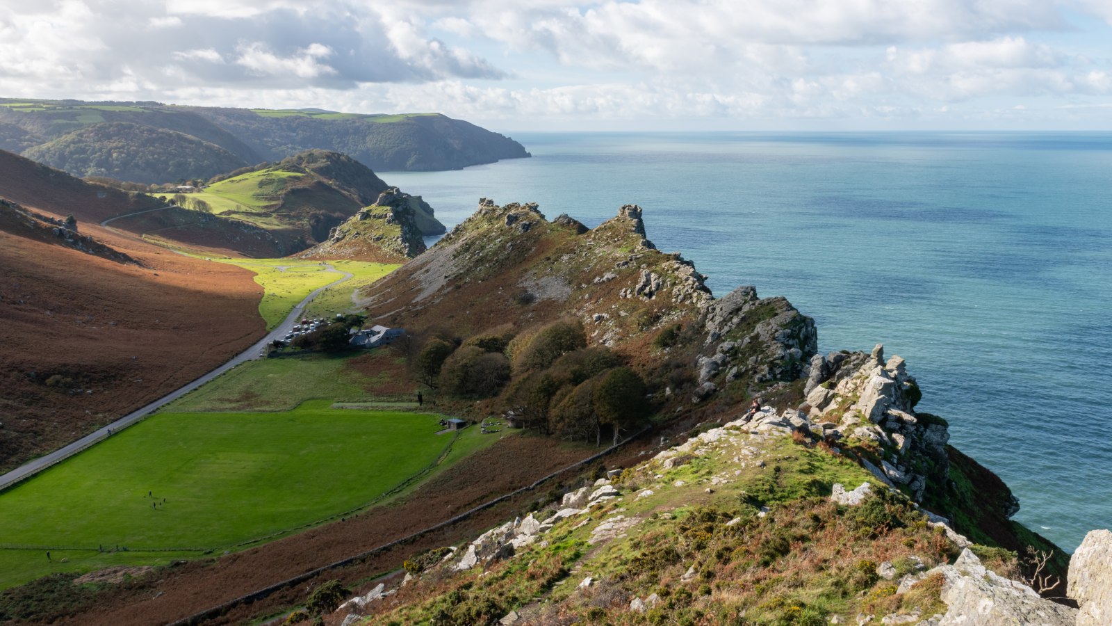 A bird's eye view of the Valley of the Rocks in Exmoor National Park with the valley basin, cliffs and road in focus